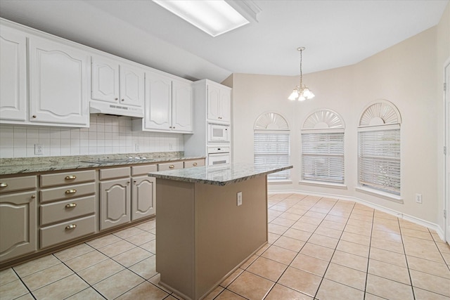 12072 Half Hitch Trl, Frisco, TX 75035 - kitchen featuring an inviting chandelier, white appliances, under cabinet range hood, decorative backsplash, and light tile patterned flooring
