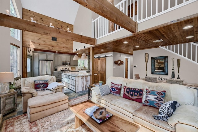 living room featuring recessed lighting, stairs, a barn door, visible vents, and wood ceiling