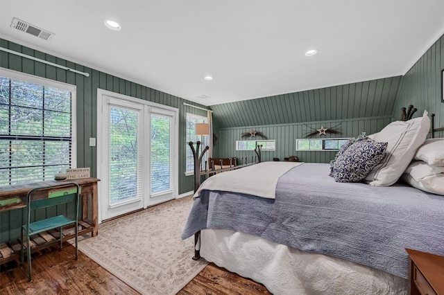 bedroom with visible vents, access to exterior, recessed lighting, and wood finished floors
