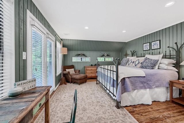bedroom with visible vents, recessed lighting, and wood finished floors