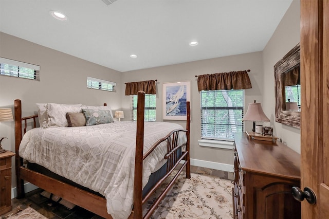 bedroom featuring recessed lighting and baseboards