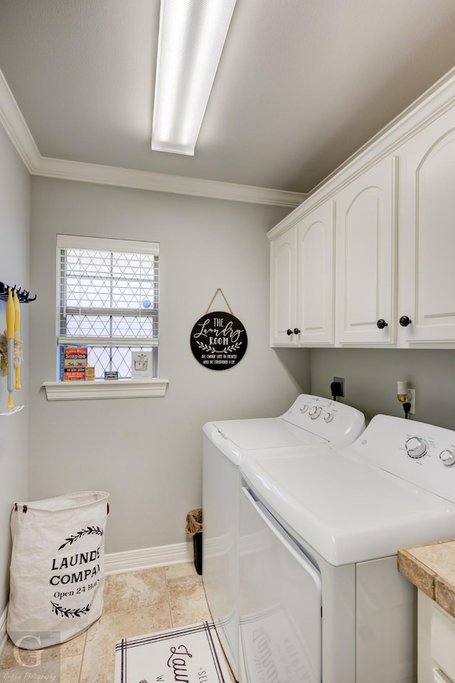 5310 Lucerne Ln, Bossier City, LA 71112 - laundry room with cabinet space, ornamental molding, washing machine and clothes dryer, and baseboards