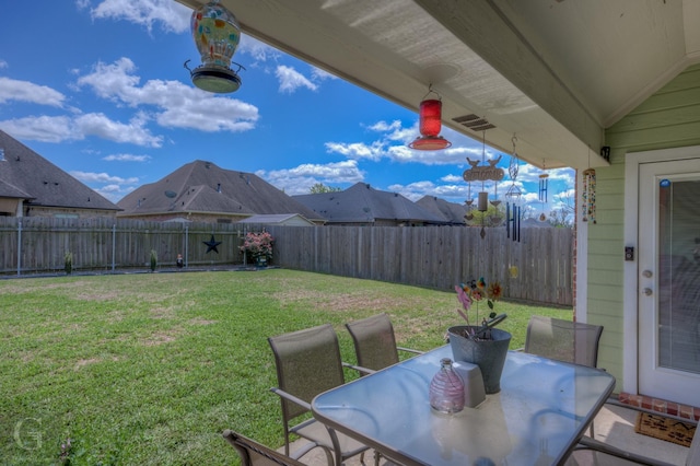 5310 Lucerne Ln, Bossier City, LA 71112 - view of yard featuring outdoor dining space and a fenced backyard