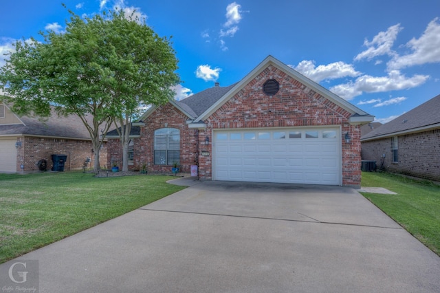 5310 Lucerne Ln, Bossier City, LA 71112 - view of front of house featuring driveway, an attached garage, a front lawn, brick siding, and a shingled roof