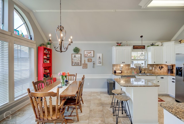 5310 Lucerne Ln, Bossier City, LA 71112 - kitchen featuring white cabinetry, a sink, and light stone counters