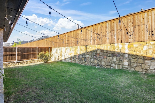 view of yard with fence
