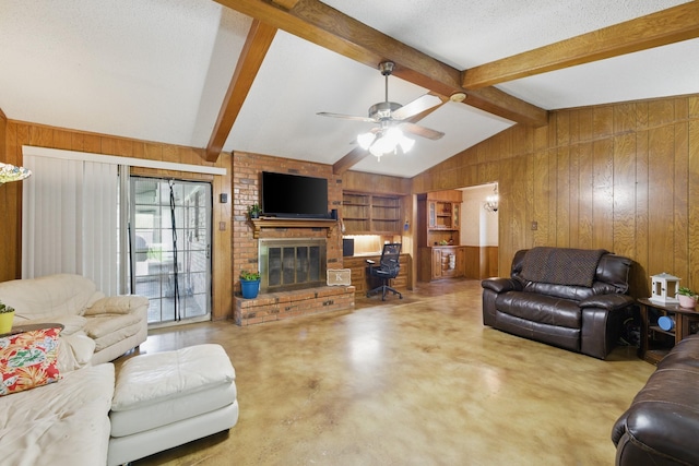 112 Charles St, Desoto, TX 75115 - living area featuring lofted ceiling with beams, wood walls, a brick fireplace, and ceiling fan