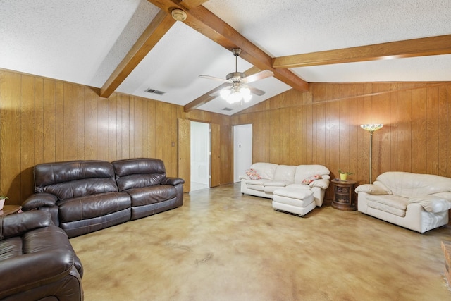 112 Charles St, Desoto, TX 75115 - living area featuring wooden walls, ceiling fan, lofted ceiling with beams, and visible vents