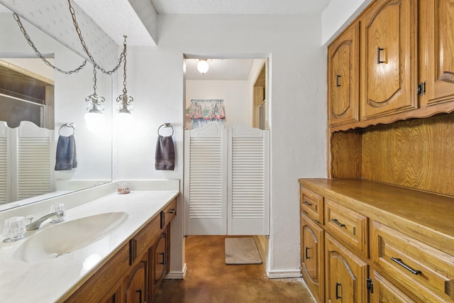 112 Charles St, Desoto, TX 75115 - bathroom with concrete flooring, vanity, a closet, and a stall shower