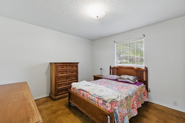 112 Charles St, Desoto, TX 75115 - bedroom featuring baseboards and a textured ceiling