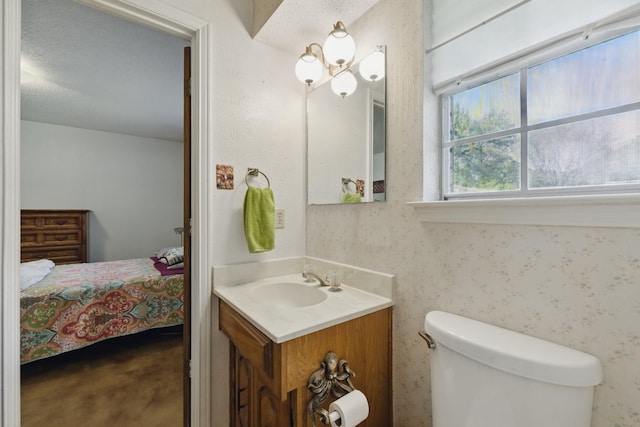 112 Charles St, Desoto, TX 75115 - bathroom with toilet, vanity, and ensuite bathroom