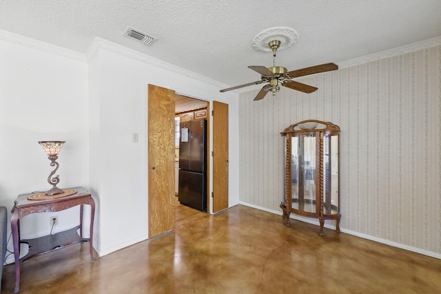 112 Charles St, Desoto, TX 75115 - unfurnished room with visible vents, ornamental molding, a textured ceiling, finished concrete flooring, and ceiling fan