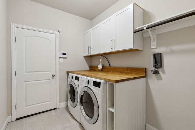 619 Southwestern Dr, Rockwall, TX 75087 - washroom featuring independent washer and dryer, cabinet space, and light tile patterned flooring