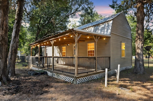 exterior space with metal roof
