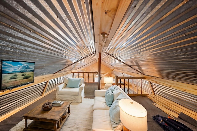 interior space with wood walls, wooden ceiling, and vaulted ceiling