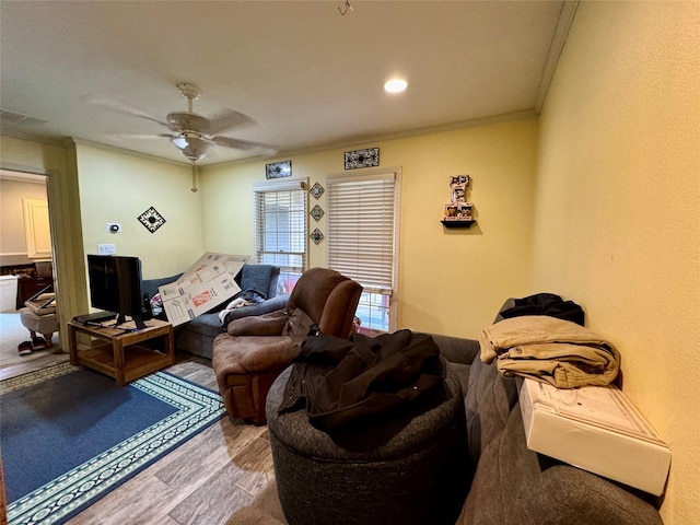 2124 Parkhaven Dr, Plano, TX 75075 - living room with visible vents, a ceiling fan, ornamental molding, and wood finished floors