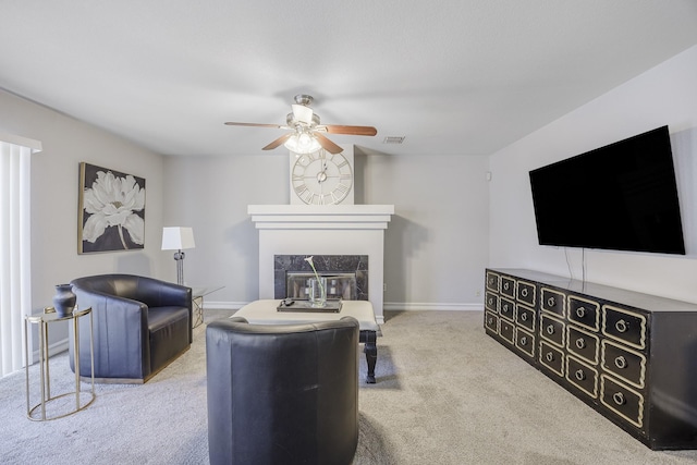 3144 Longbow Dr, Grand Prairie, TX 75052 - living room with carpet, a ceiling fan, baseboards, a high end fireplace, and visible vents