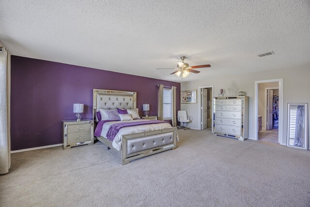 3144 Longbow Dr, Grand Prairie, TX 75052 - bedroom featuring ceiling fan, carpet flooring, a textured ceiling, and visible vents