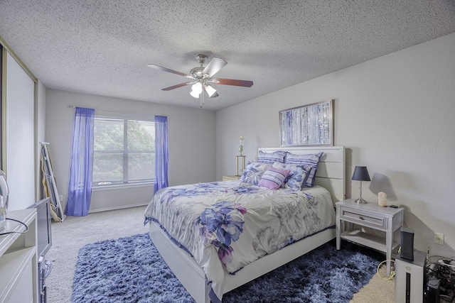 3144 Longbow Dr, Grand Prairie, TX 75052 - carpeted bedroom featuring a textured ceiling and ceiling fan