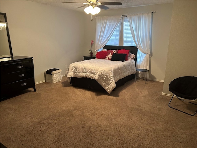 3144 Longbow Dr, Grand Prairie, TX 75052 - bedroom featuring carpet floors, a ceiling fan, a textured ceiling, and baseboards