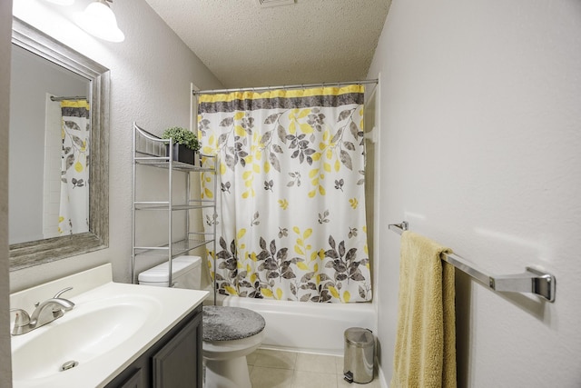 3144 Longbow Dr, Grand Prairie, TX 75052 - full bathroom with a textured ceiling, tile patterned flooring, shower / tub combo, vanity, and toilet