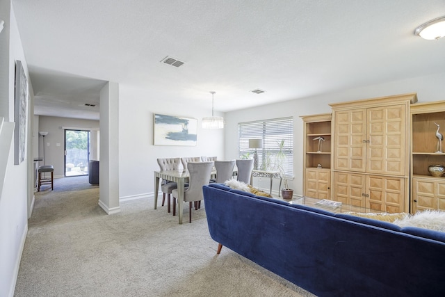 3144 Longbow Dr, Grand Prairie, TX 75052 - living room featuring carpet floors, plenty of natural light, and visible vents