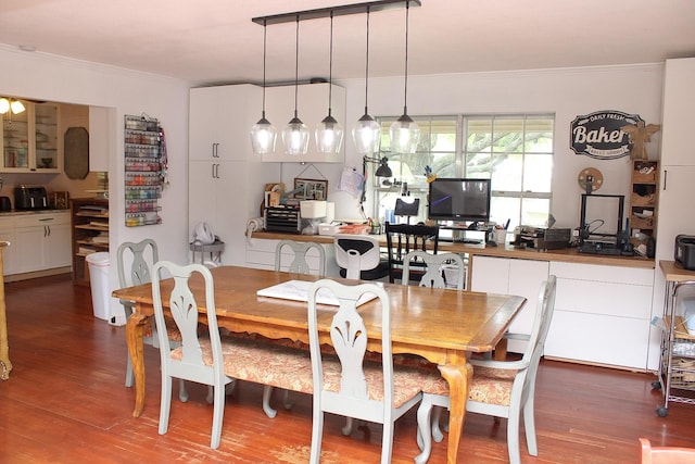 7650 Shade Tree Ln, Celina, TX 75009 - dining space with ornamental molding, wood finished floors, and an office area
