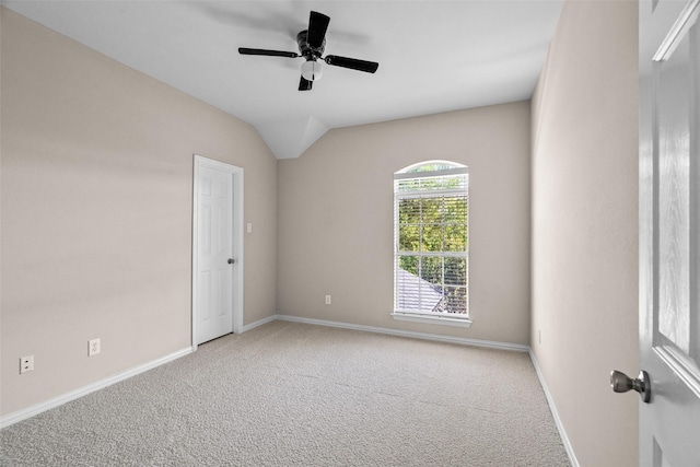 5921 Colby Dr, Plano, TX 75094 - spare room featuring carpet flooring, baseboards, a ceiling fan, and vaulted ceiling