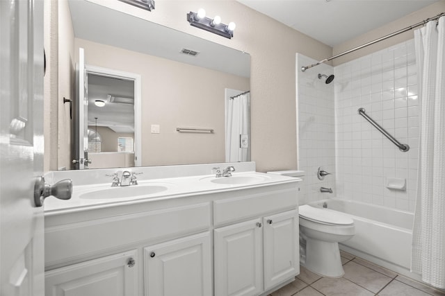 5921 Colby Dr, Plano, TX 75094 - full bathroom featuring shower / bath combination with curtain, visible vents, a sink, tile patterned floors, and double vanity