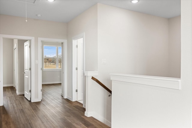 525 Galt Dr, Stephenville, TX 76401 - hallway with baseboards, an upstairs landing, recessed lighting, attic access, and wood finished floors