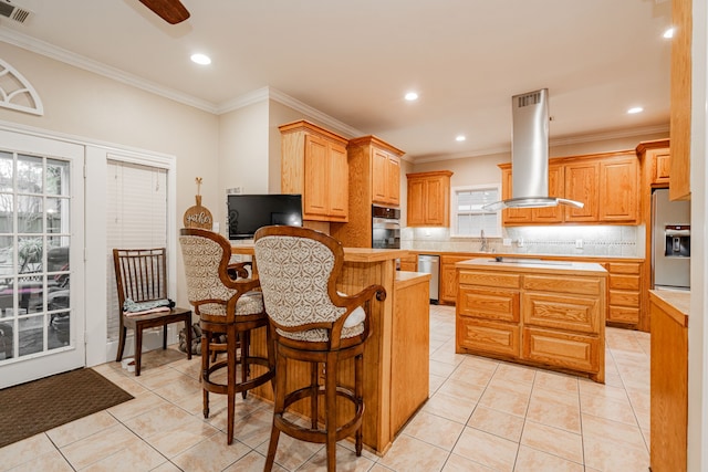 kitchen with light countertops, backsplash, visible vents, appliances with stainless steel finishes, and island range hood
