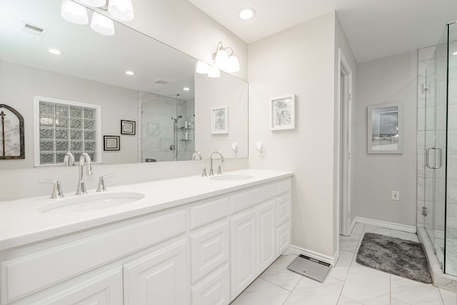 bathroom with double vanity, visible vents, a sink, and a stall shower