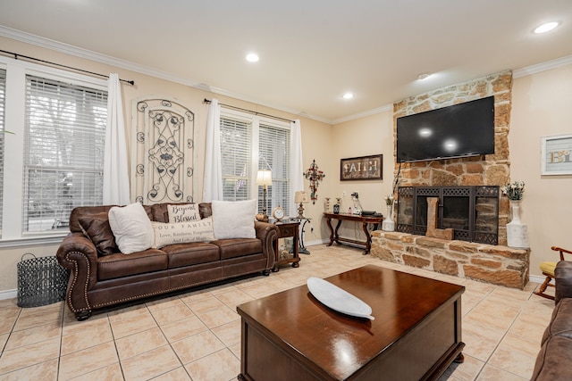 living room with light tile patterned floors, ornamental molding, and a wealth of natural light