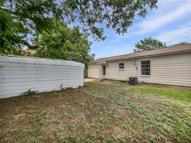 1209 Sylvan Dr, Garland, TX 75040 - view of yard with central AC unit and fence