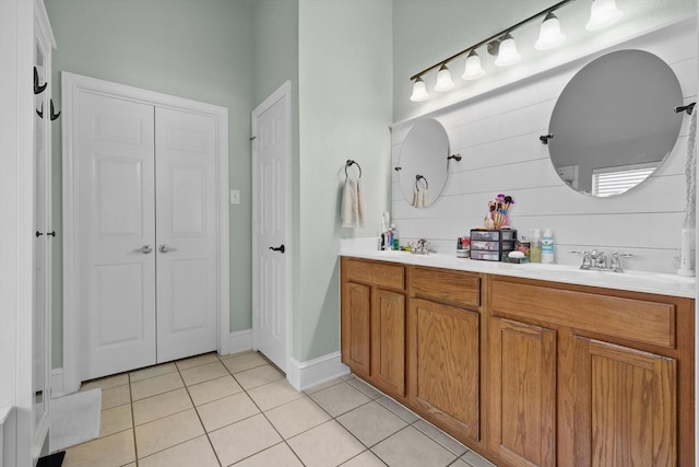 1236 Spanish Moss Dr, Savannah, TX 76227 - full bathroom featuring tile patterned flooring, double vanity, and a closet