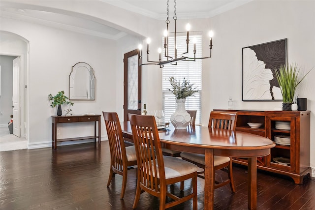 2542 Morgan Ln, Trophy Club, TX 76262 - dining room with arched walkways, hardwood / wood-style floors, a chandelier, ornamental molding, and baseboards
