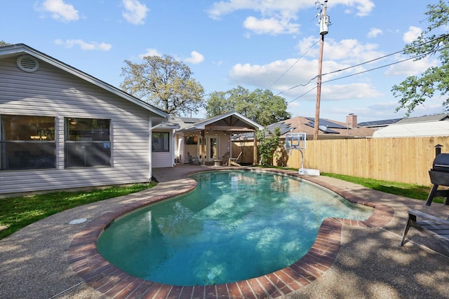 1119 Mockingbird Dr, Grapevine, TX 76051 - view of swimming pool with a patio, a fenced in pool, and a fenced backyard