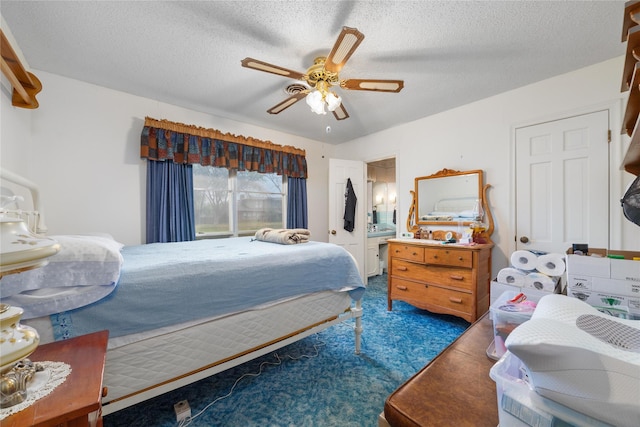 2107 Elizabeth Dr, Brownwood, TX 76801 - bedroom with carpet floors, ceiling fan, and a textured ceiling