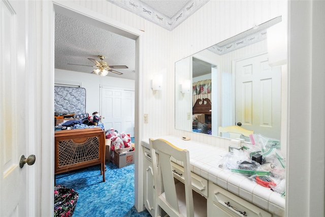 2107 Elizabeth Dr, Brownwood, TX 76801 - bathroom featuring a textured ceiling and a ceiling fan
