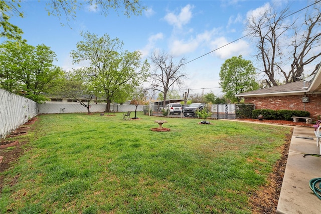 2107 Elizabeth Dr, Brownwood, TX 76801 - view of yard featuring a fenced backyard