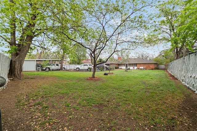 2107 Elizabeth Dr, Brownwood, TX 76801 - view of yard featuring a fenced backyard