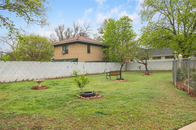 2107 Elizabeth Dr, Brownwood, TX 76801 - view of yard with a fenced backyard