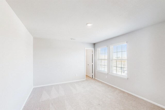 1813 Osage Trl, Mesquite, TX 75149 - empty room featuring baseboards and light colored carpet