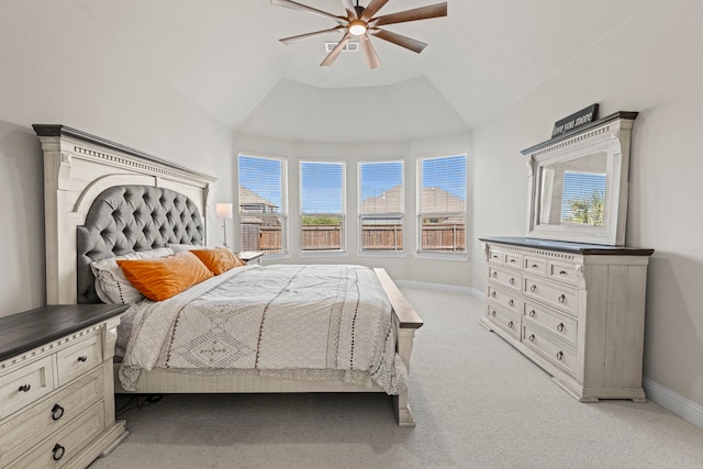 1036 Wedgewood Dr, Forney, TX 75126 - bedroom with multiple windows, light carpet, vaulted ceiling, and a ceiling fan