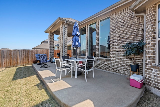 1036 Wedgewood Dr, Forney, TX 75126 - view of patio featuring fence and outdoor dining area