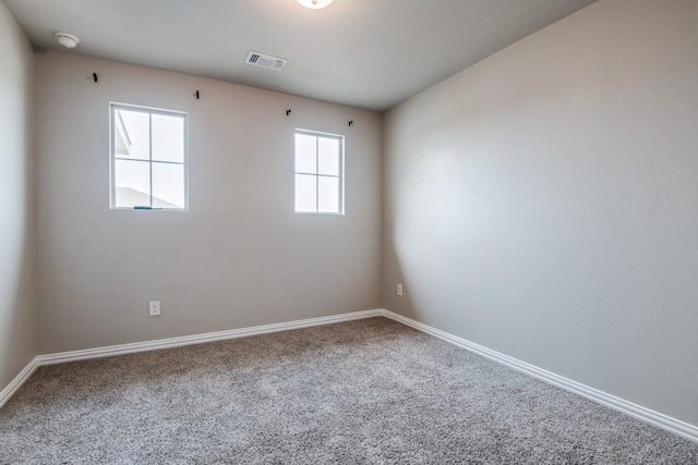 5219 Amistad Ave, Royse City, TX 75189 - empty room featuring carpet flooring, baseboards, and a smoke detector