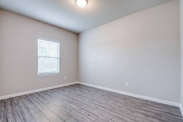 5219 Amistad Ave, Royse City, TX 75189 - spare room featuring wood finished floors and baseboards