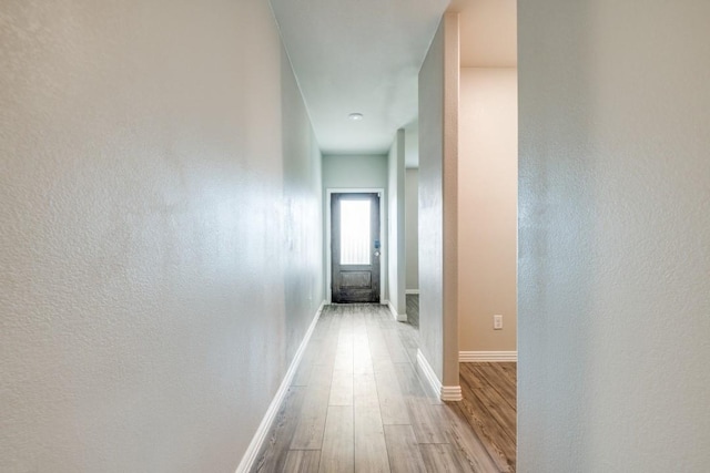 5219 Amistad Ave, Royse City, TX 75189 - hall featuring wood finished floors and baseboards