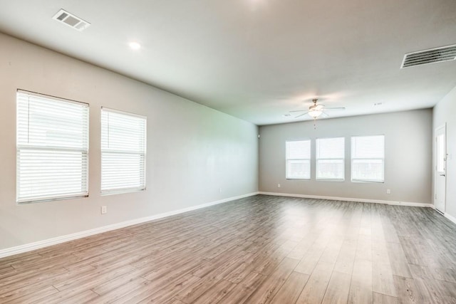 5219 Amistad Ave, Royse City, TX 75189 - unfurnished room with ceiling fan, wood finished floors, and baseboards