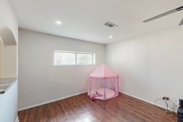 recreation room featuring visible vents, baseboards, recessed lighting, and wood finished floors